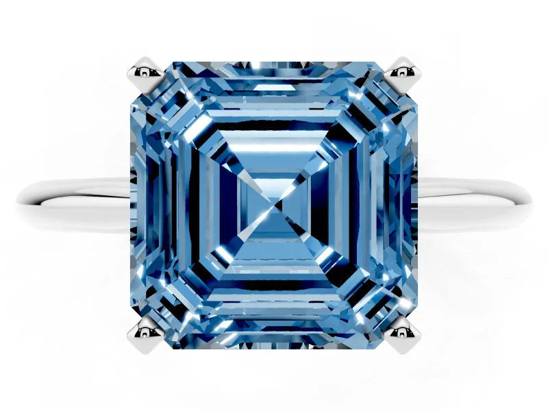 Fancy Blue Asscher Cut Diamond Solitaire Ring Set in Silver with Prong Setting on a Plain Round Band