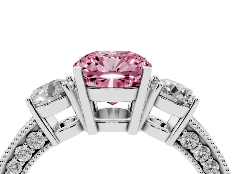 Fancy Pink Cushion Cut Diamond Three-Stone Ring Set in White gold with Round Side Stones and Pavé Band