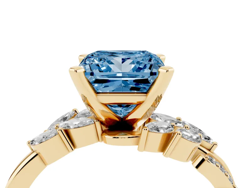 Fancy Blue Princess Cut Diamond Solitaire Ring Set in Yellow gold with Marquise Twist Band and Prong Setting