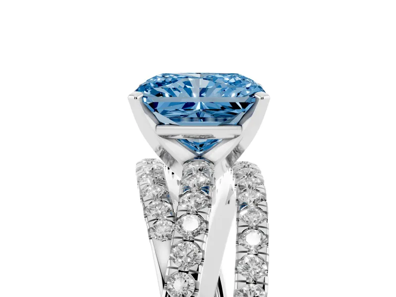 Fancy Blue Radiant Cut Diamond Solitaire Twist Band Ring Set in White gold with Pavé Setting and Prong Head