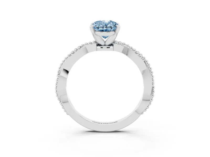 Fancy Blue Oval Cut Diamond Solitaire Ring Set in Platinum with Twisted Band and Bead Prong Setting