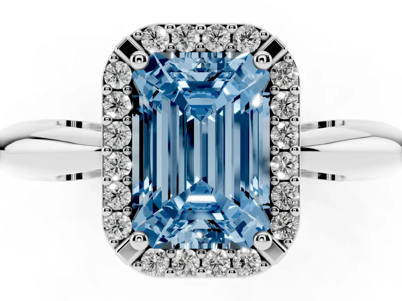 Fancy Blue Emerald Cut Diamond Halo Engagement Ring Set in White gold with Plain Split Shank and Prong Setting