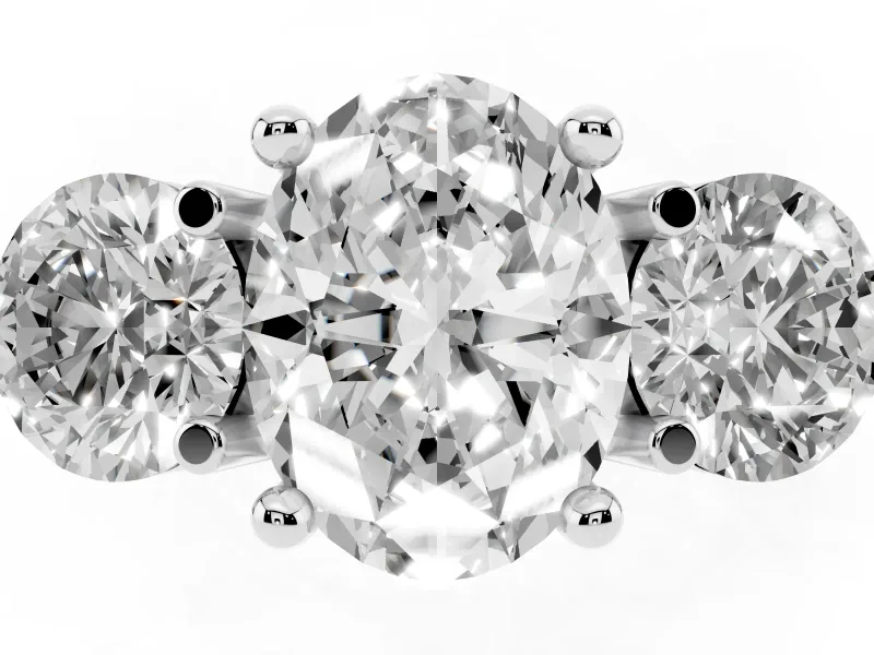Oval Cut Diamond Three-Stone Ring Set in White gold with Prong Setting and Classic Band