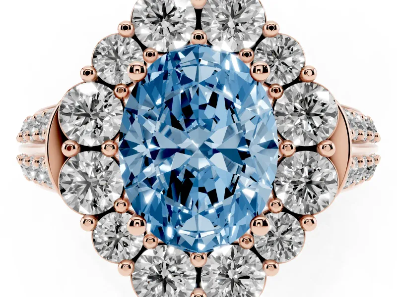 Fancy Blue Oval Cut Diamond Halo Engagement Ring Set in Rose gold with Split Shank and Prong Setting