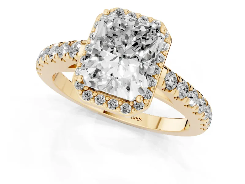 Radiant Cut Diamond Halo Engagement Ring Set in Yellow gold with Pavé Band and Prong Setting