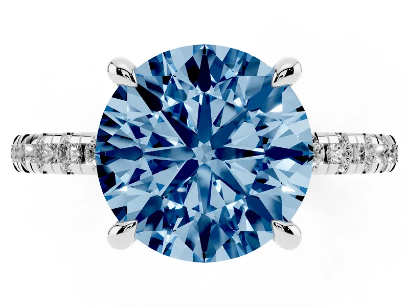 Fancy Blue Round Cut Diamond Brilliant Solitaire Ring Set in Silver with Pavé Band and Prong Setting