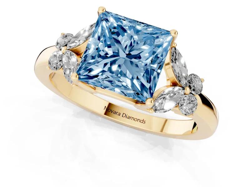 Fancy Blue Princess Cut Diamond Solitaire Floral Ring Set in Yellow gold with Marquise Petals and Prong Setting