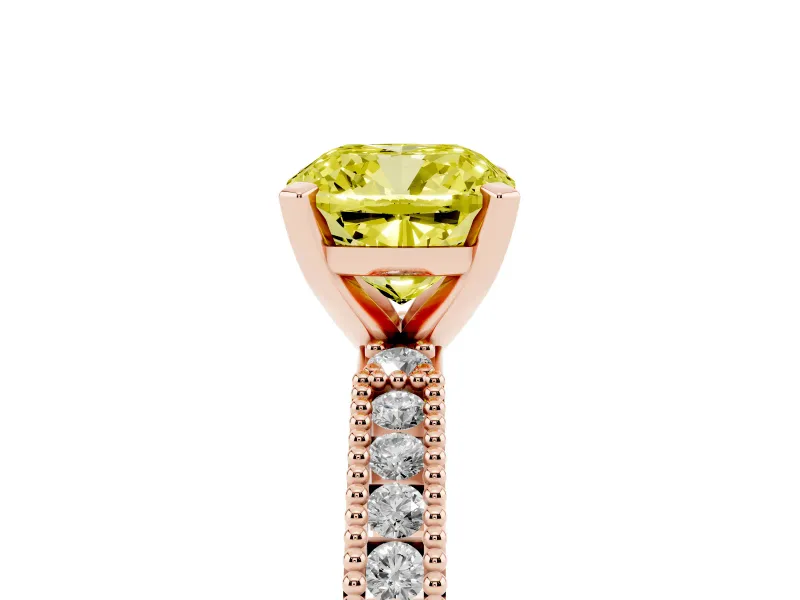 Fancy Yellow Cushion Cut Diamond Solitaire Ring Set in Rose gold with Slim Pavé Band and Prong Setting