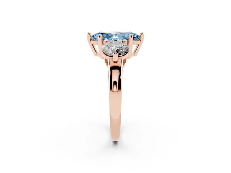 Fancy Blue Marquise Cut Diamond Three-Stone Ring Set in Rose gold with Prong Setting and Classic Band