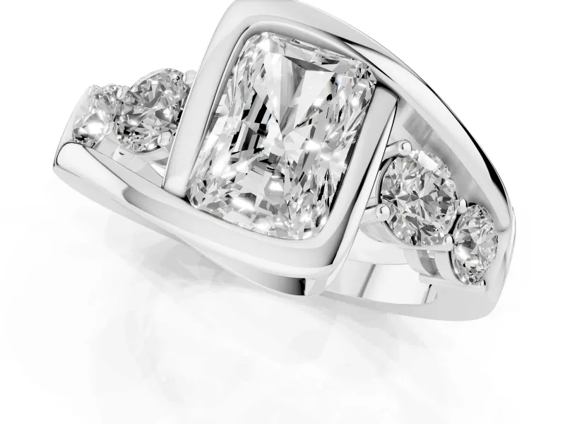 Radiant Cut Diamond Bezel Bypass Ring Set in White gold with Round Accents