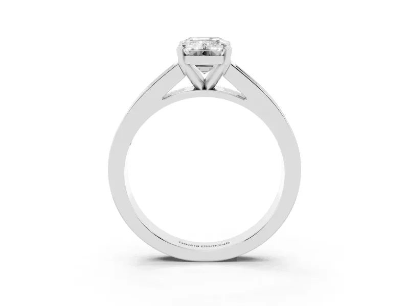 Emerald Cut Diamond Solitaire Ring Set in Silver with Channel-Set Band and Prong Setting