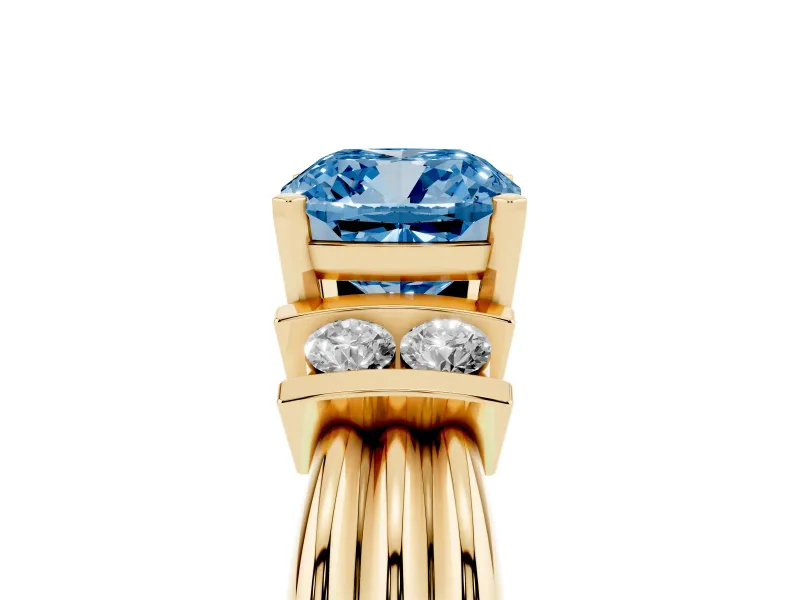 Fancy Blue Three-Stone Cushion Cut Diamond Channel Set Ring Set in Yellow gold with Bar Prongs