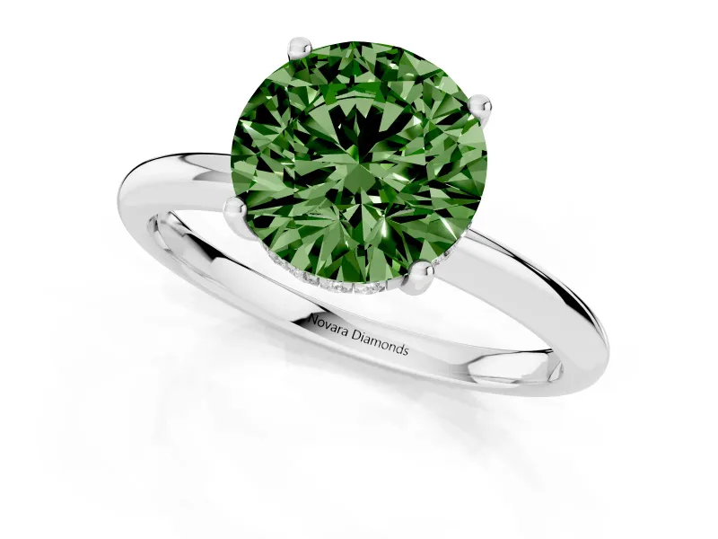 Fancy Green Round Cut Diamond Solitaire Engagement Ring Set in White gold with Prong Setting and Polished Band