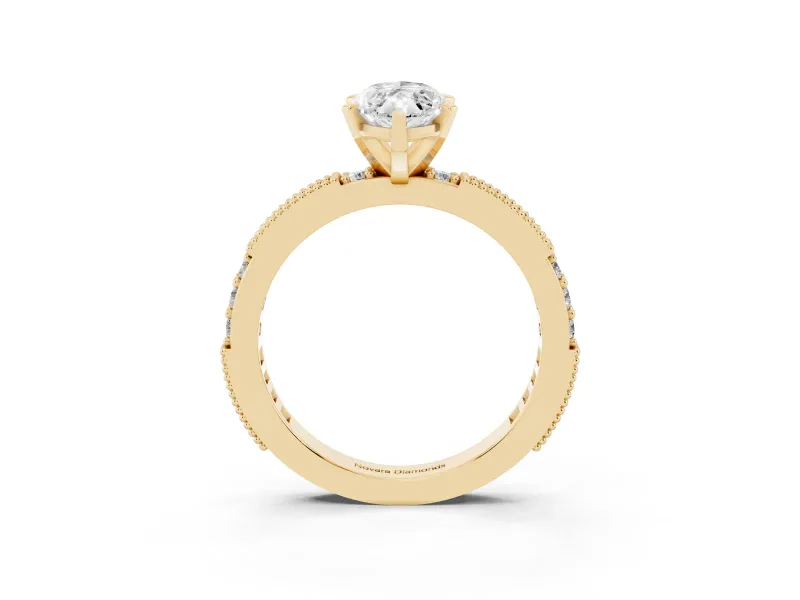 Marquise Cut Diamond Solitaire Ring Set in Yellow gold with Slim Pavé Band and Prong Setting