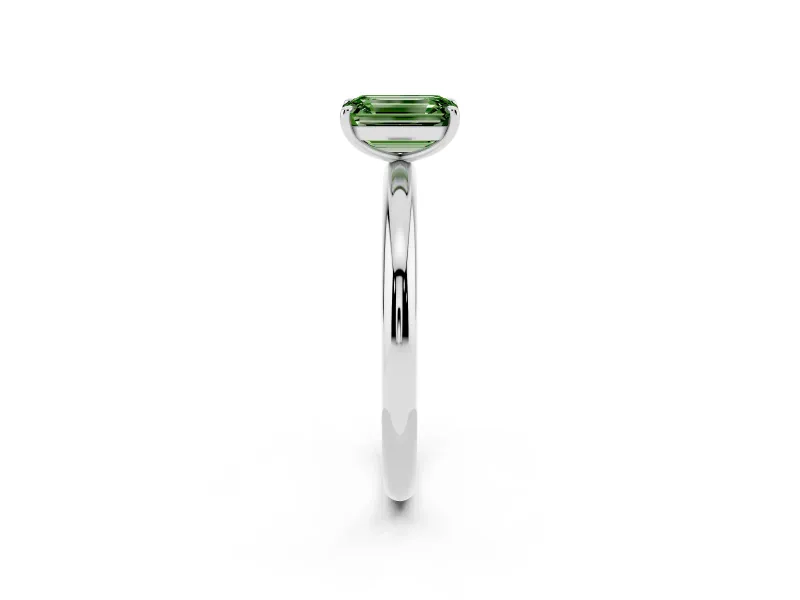 Fancy Green Emerald Cut Diamond Solitaire Ring Set in Platinum with Prong Setting on a Polished Plain Band