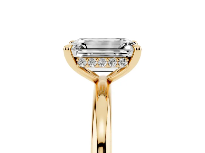 Emerald Cut Diamond Solitaire Ring Set in Yellow gold with Thin Band and Prong Setting