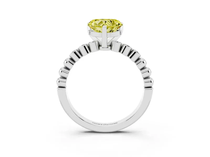 Fancy Yellow Heart Cut Diamond Solitaire Engagement Ring Set in White gold with Bezel Accents on Beaded Band
