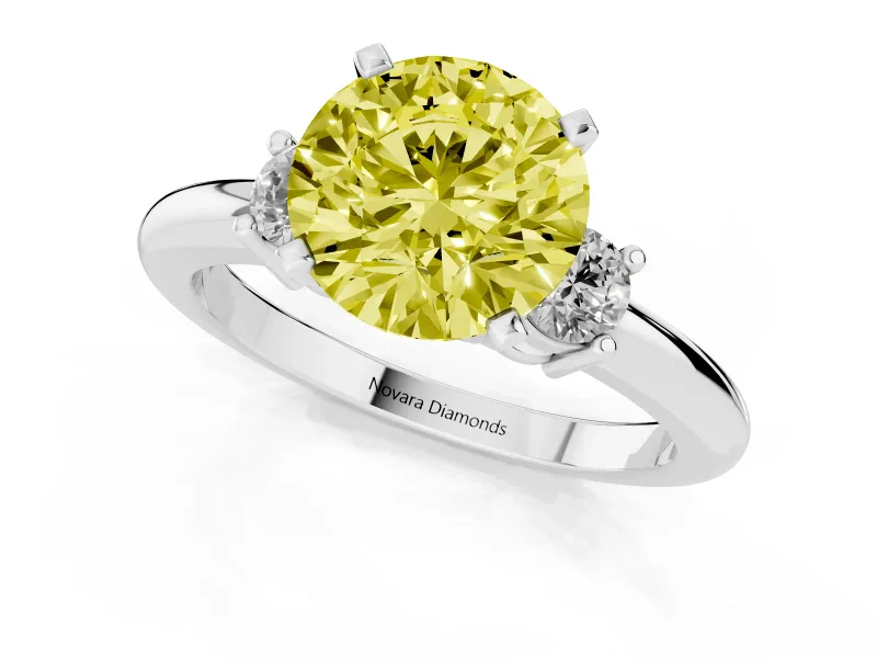 Fancy Yellow Three-Stone Round Cut Diamond Ring Set in Silver with Prong Setting and Plain Band