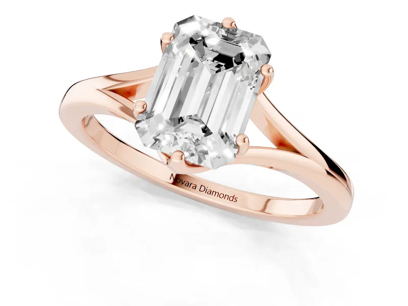 Emerald Cut Diamond Solitaire Ring Set in Rose gold with Polished Tapered Band and Prong Setting