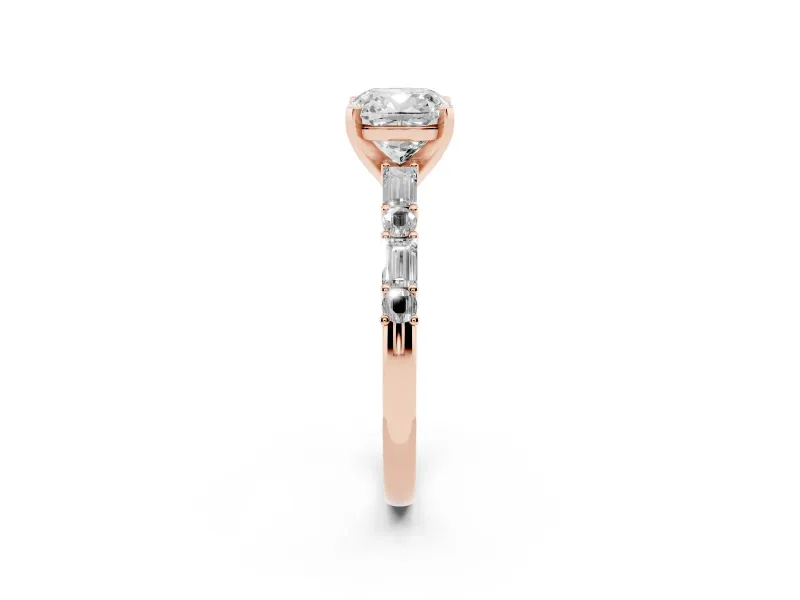 Cushion Cut Diamond Solitaire Set in Rose gold with Side Baguettes and Channel Set Band