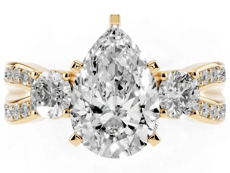 Three-Stone Pear Cut Diamond Twist Band Ring Set in Yellow gold with Pavé Accents and Prong Setting