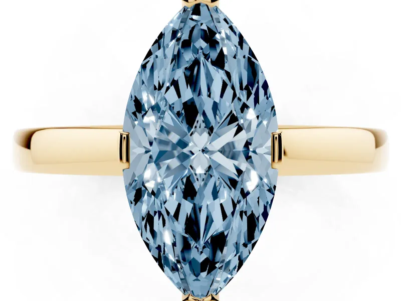 Fancy Blue Marquise Cut Diamond Solitaire Ring Set in Yellow gold with Prong Head and Smooth Polished Band