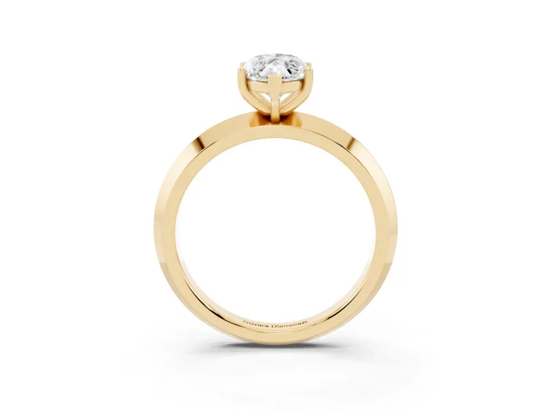 Marquise Cut Diamond Solitaire Engagement Ring Set in Yellow gold with Flat Band and Prong Setting