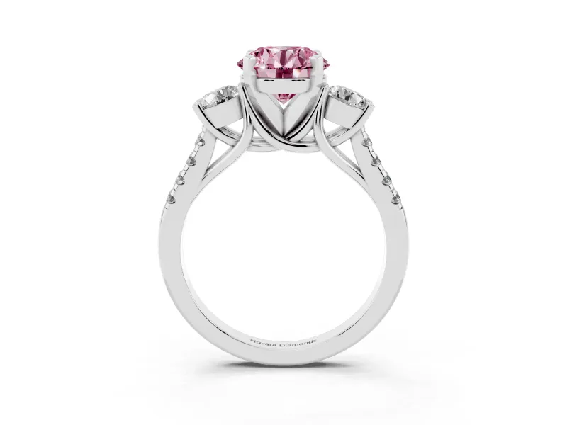 Fancy Pink Three-Stone Round Cut Diamond Pavé Band Ring Set in Platinum with Prong-Set Trio