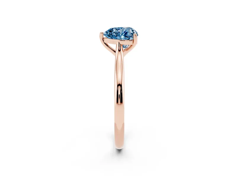 Fancy Blue Heart Cut Diamond Solitaire Ring Set in Rose gold with Cathedral Band and Prong Setting