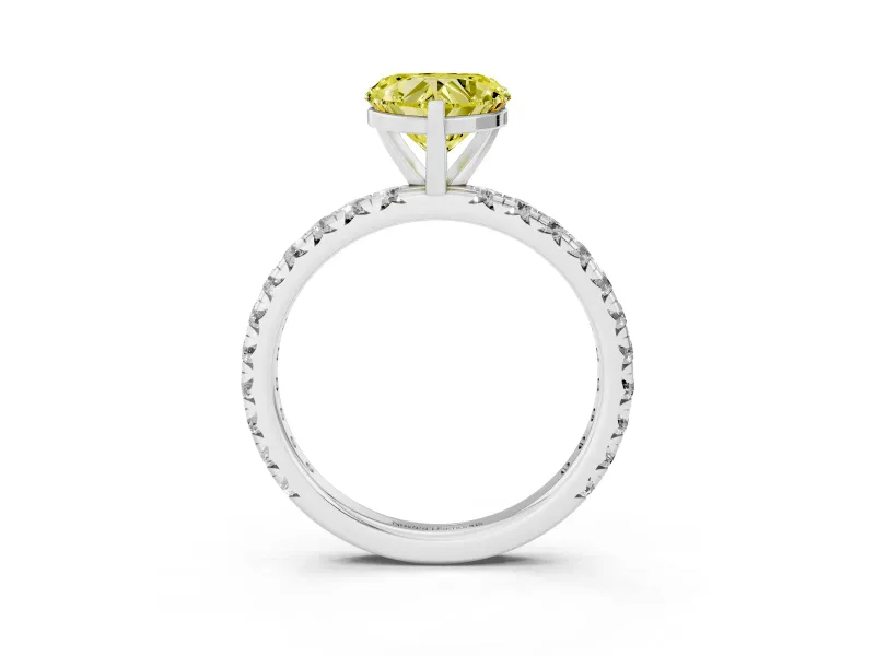 Fancy Yellow Heart Cut Diamond Pavé Solitaire Ring Set in White gold with Round Band and Prong Setting