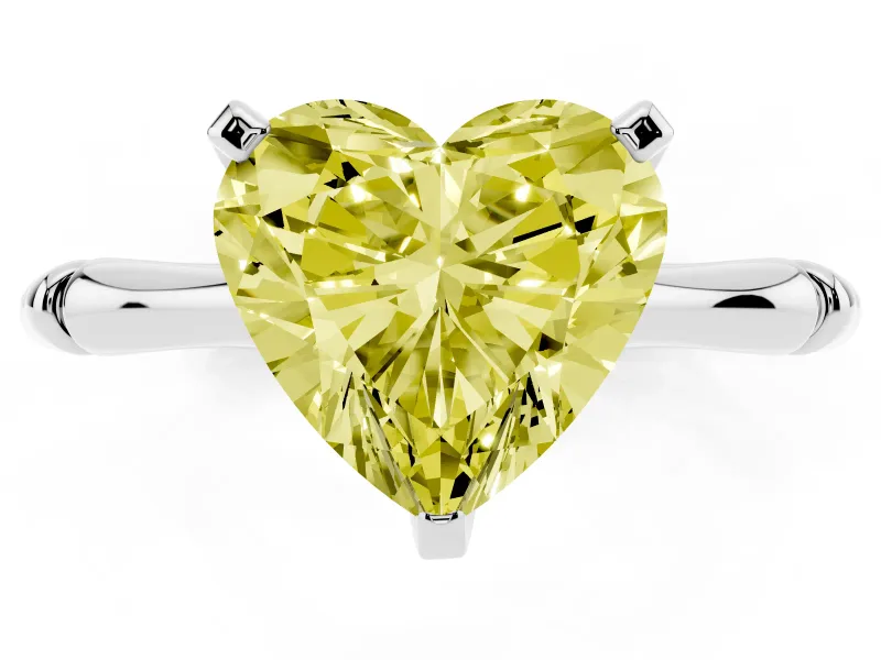 Fancy Yellow Heart Cut Diamond Solitaire Ring Set in Silver with Bamboo Band and Prong Setting