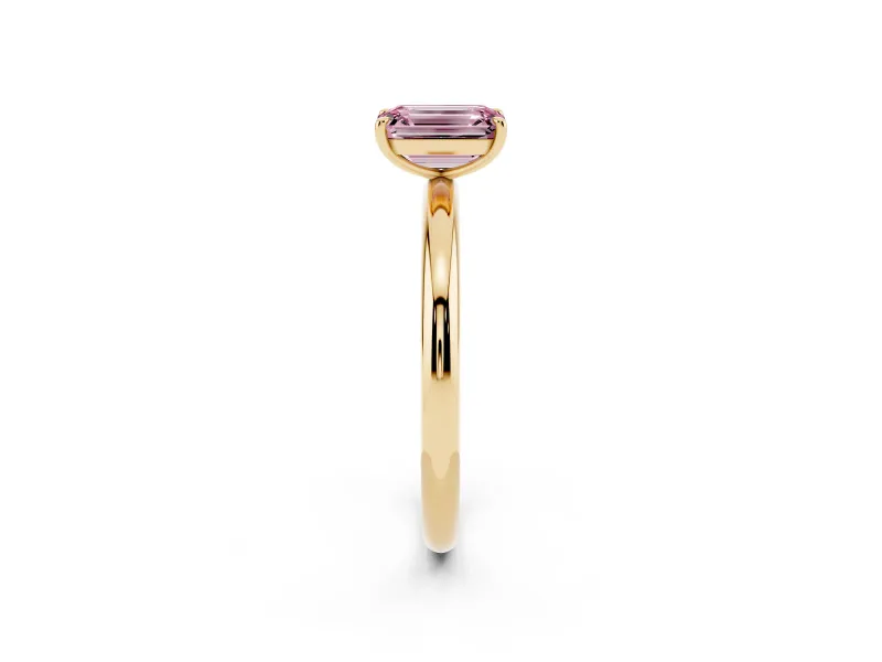 Fancy Pink Emerald Cut Diamond Solitaire Ring Set in Yellow gold with Prong Setting on a Polished Plain Band