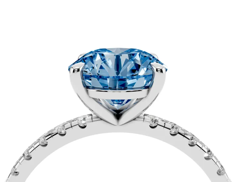 Fancy Blue Round Cut Diamond Brilliant Solitaire Ring Set in White gold with Pavé Band and Prong Setting