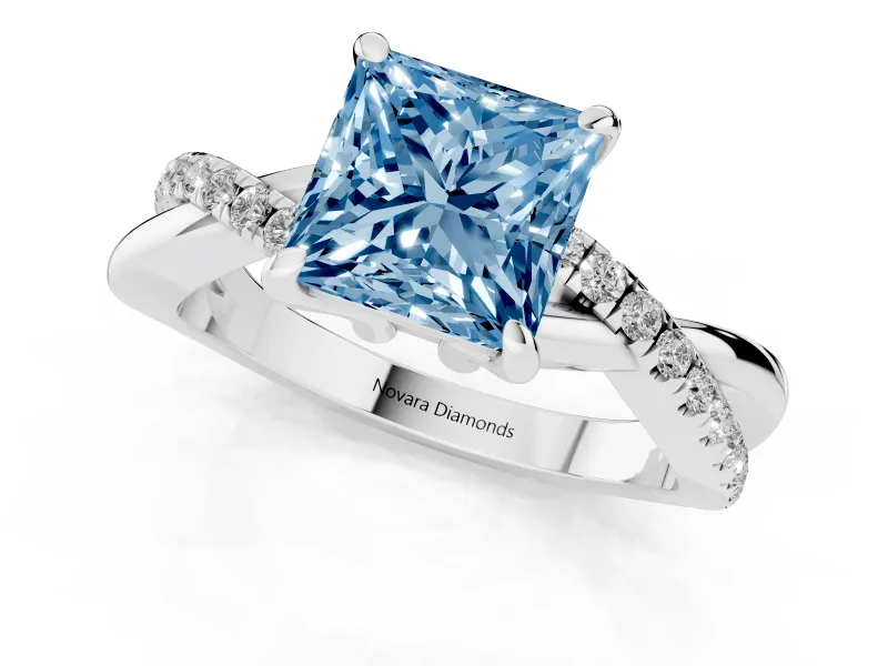 Fancy Blue Princess Cut Diamond Twist Band Solitaire Set in White gold with Pavé Accents and Prong Setting