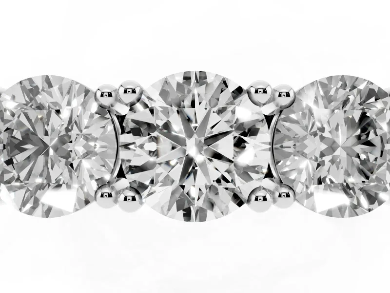 Round Cut Diamond Three-Stone Ring Set in Silver with Channel Band and Sturdy Prongs