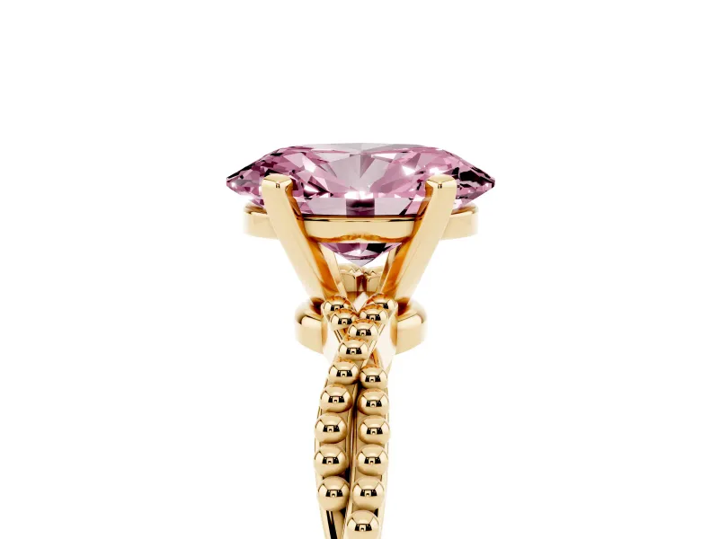 Fancy Pink Oval Cut Diamond Solitaire Ring Set in Yellow gold with Twisted Band and Bead Prong Setting