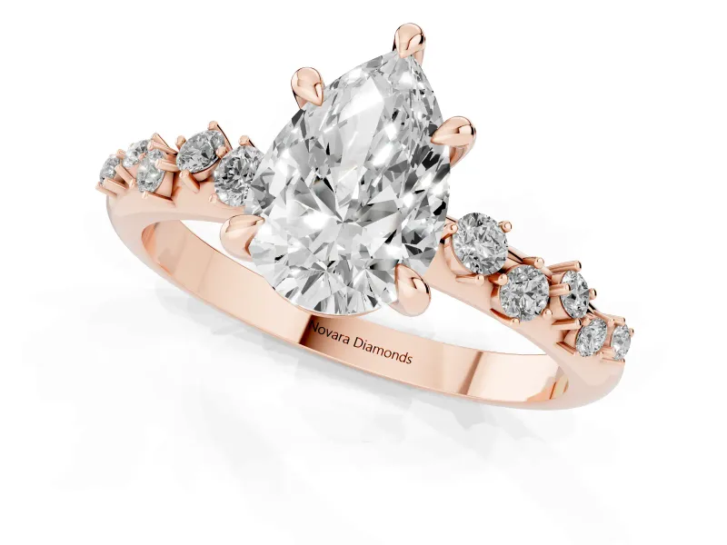 Pear Cut Diamond Solitaire Vine Band Ring Set in Rose gold with Round Accents and Prong Setting