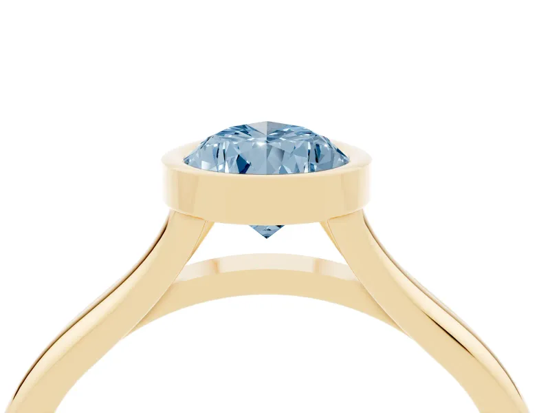 Fancy Blue Bezel Set Pear Cut Diamond Solitaire Ring Set in Yellow gold with Tapered Band