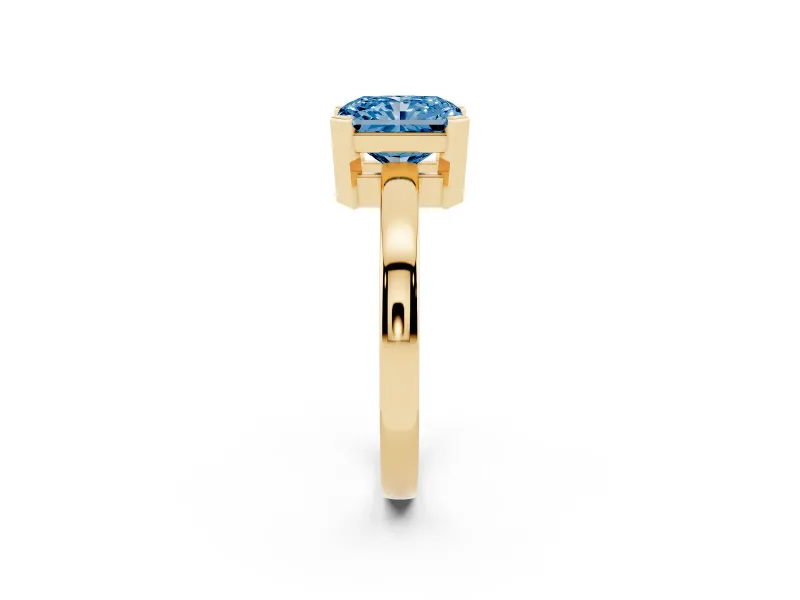 Fancy Blue Radiant Cut Diamond Solitaire Ring Set in Yellow gold with Prong Head and Smooth Polished Band