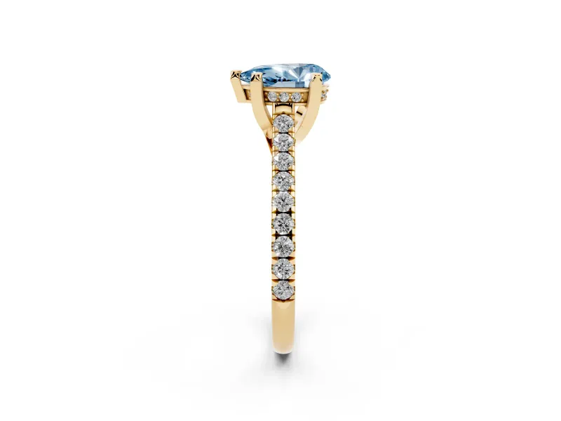 Fancy Blue Pear Cut Diamond Solitaire Ring Set in Yellow gold with Brilliant Pavé Band and Prong Setting
