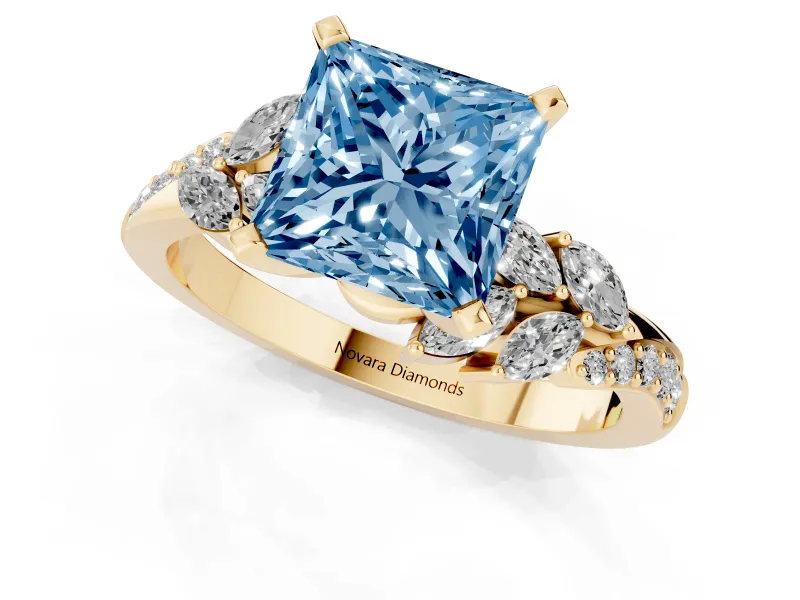 Fancy Blue Princess Cut Diamond Solitaire Ring Set in Yellow gold with Marquise Twist Band and Prong Setting