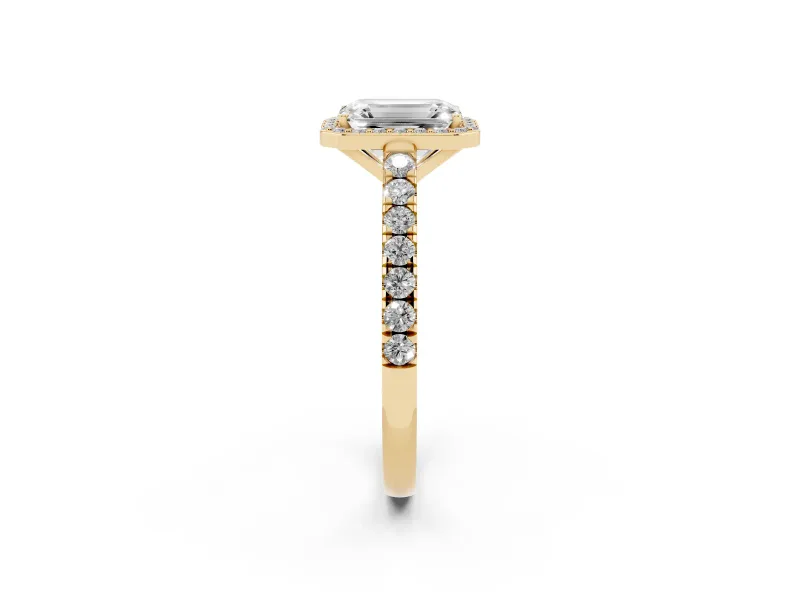 Emerald Cut Diamond Halo Engagement Ring Set in Yellow gold with Pavé Band and Prong Setting