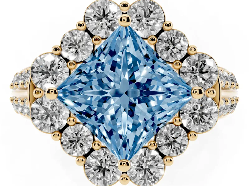 Fancy Blue Princess Cut Diamond Halo Engagement Ring Set in Yellow gold with Split Shank and Prong Setting