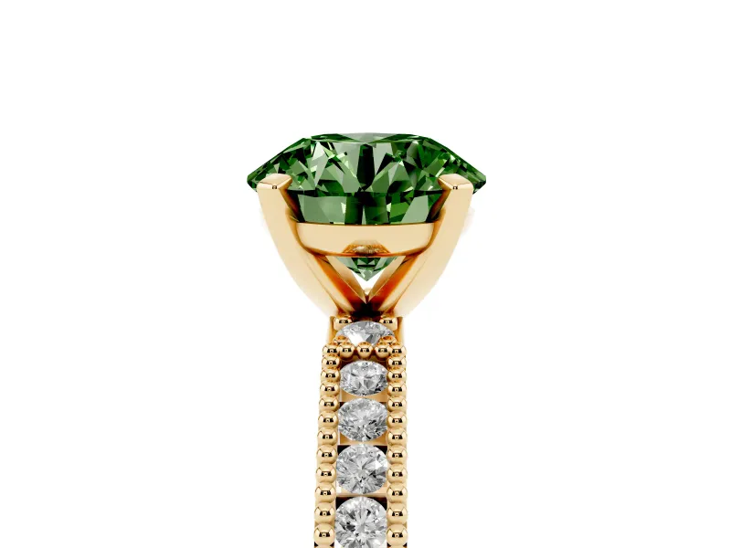 Fancy Green Round Cut Diamond Solitaire Ring Set in Yellow gold with Slim Pavé Band and Prong Setting