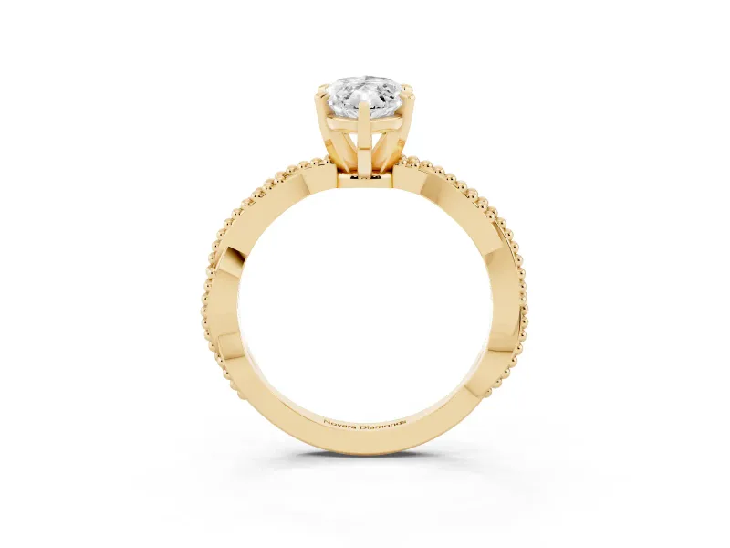 Marquise Cut Diamond Solitaire Ring Set in Yellow gold with Twisted Band and Bead Prong Setting