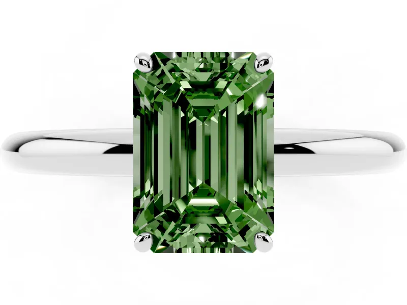 Fancy Green Emerald Cut Diamond Solitaire Ring Set in White gold with Prong Setting on a Polished Plain Band