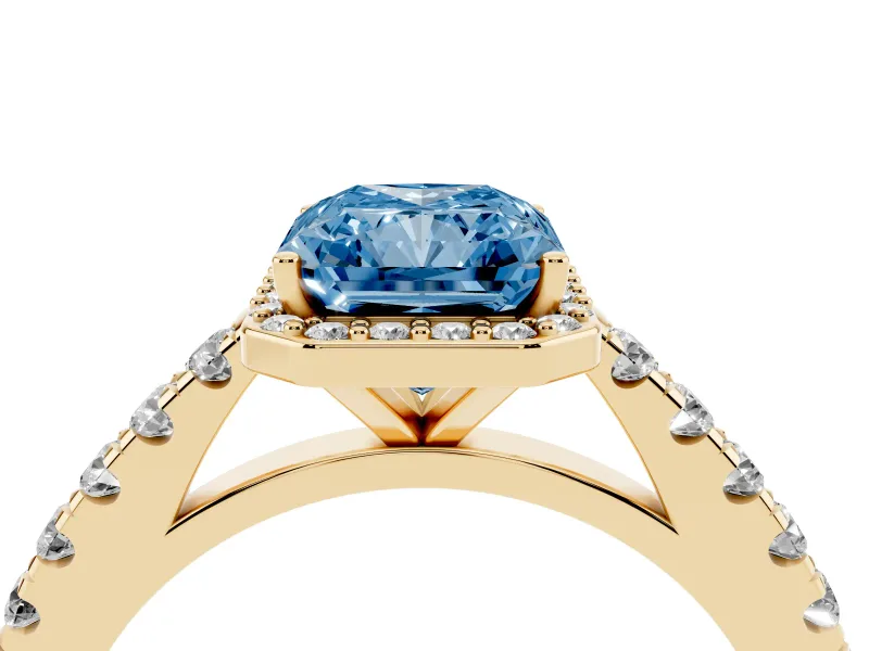 Fancy Blue Radiant Cut Diamond Halo Engagement Ring Set in Yellow gold with Pavé Band and Prong Setting