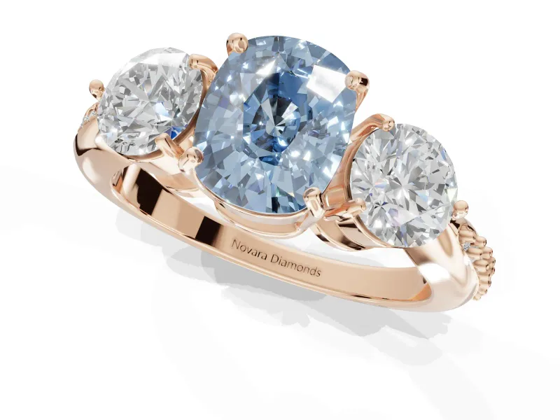 Cushion Cut Three Stone Engagement Ring Setting for a Fancy Blue Lab-Grown Diamond | Tapered Pave Band | Rose Gold