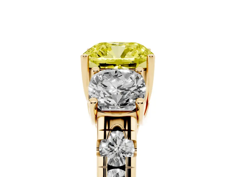 Fancy Yellow Cushion Cut Diamond Three-Stone Ring Set in Yellow gold with Pavé Band