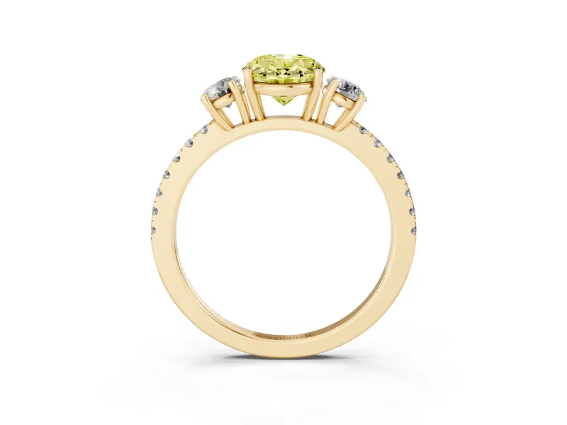 Fancy Yellow Oval Cut Diamond Three-Stone Ring Set in Yellow gold with Pavé Band and Graduated Sides